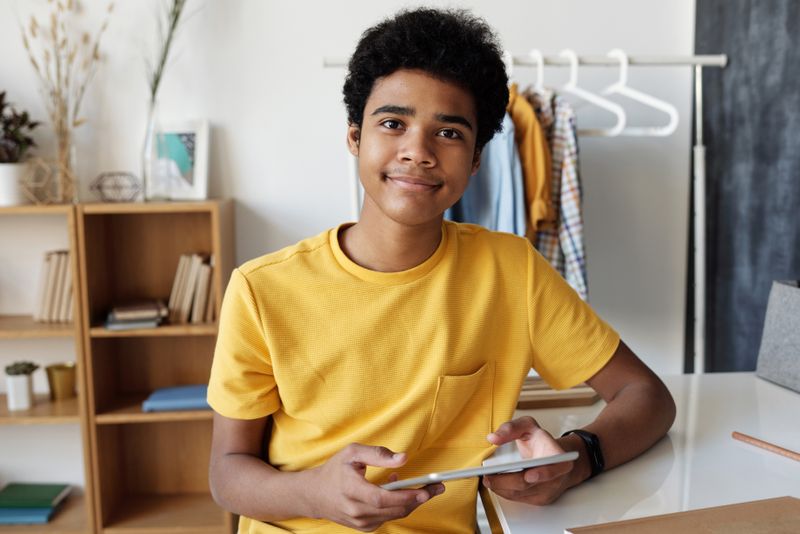 Student using a tablet for online learning