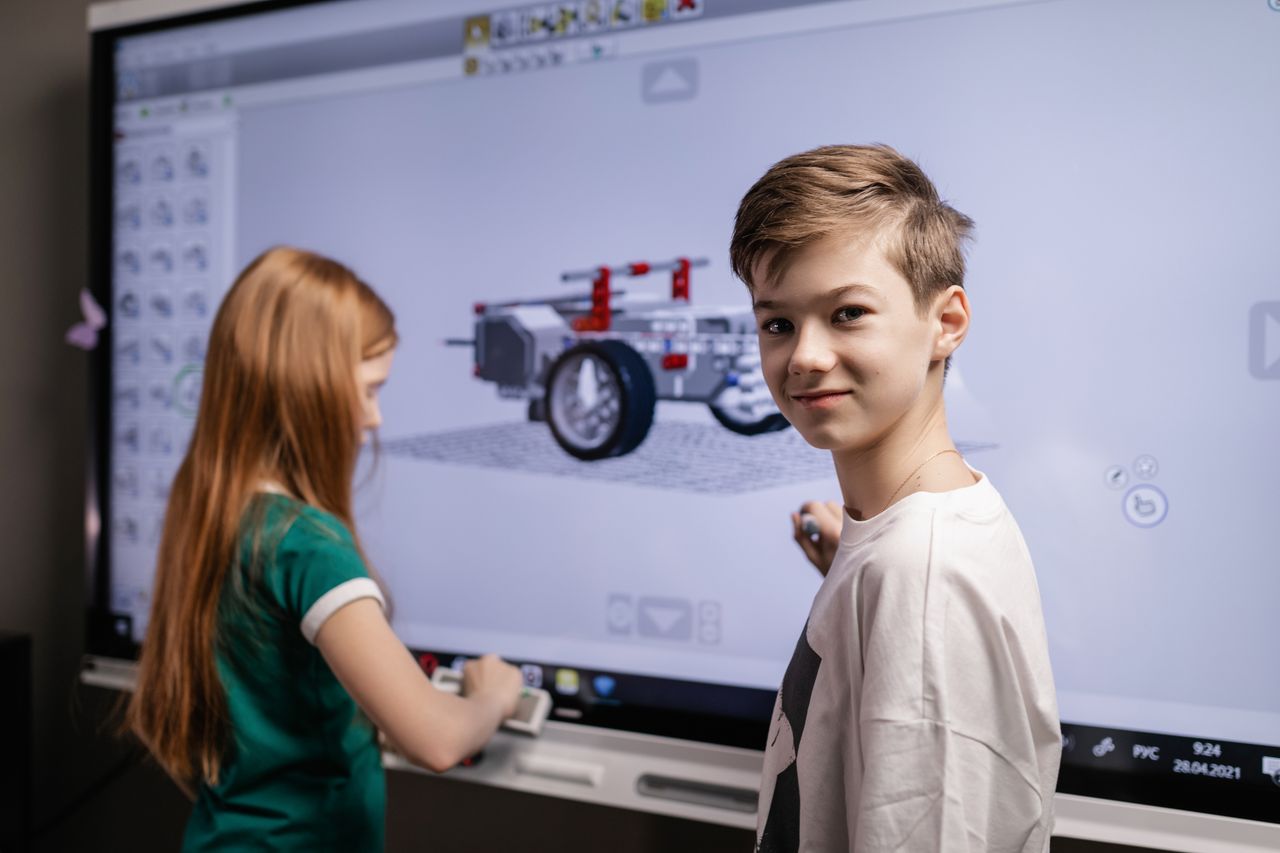 Children using a touchscreen for learning